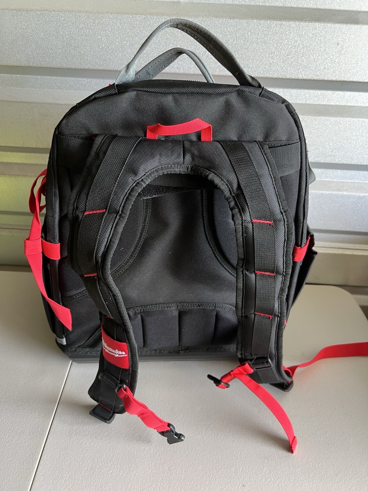 Milwaukee 48-Pocket Tear-Resistant PACKOUT Modular Storage Backpack NEEDS REPAIR