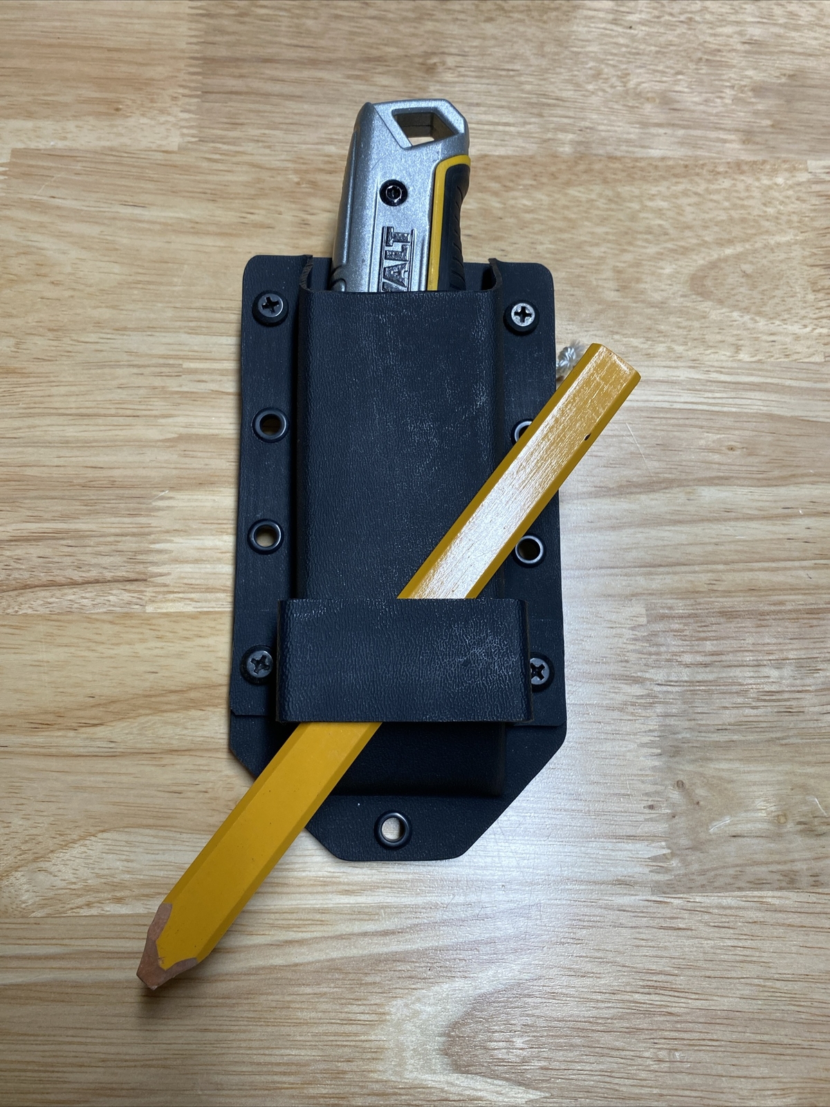 Utility knife holster and tool pouch. Cordless Drill Holster / Hanger. KYDEX.