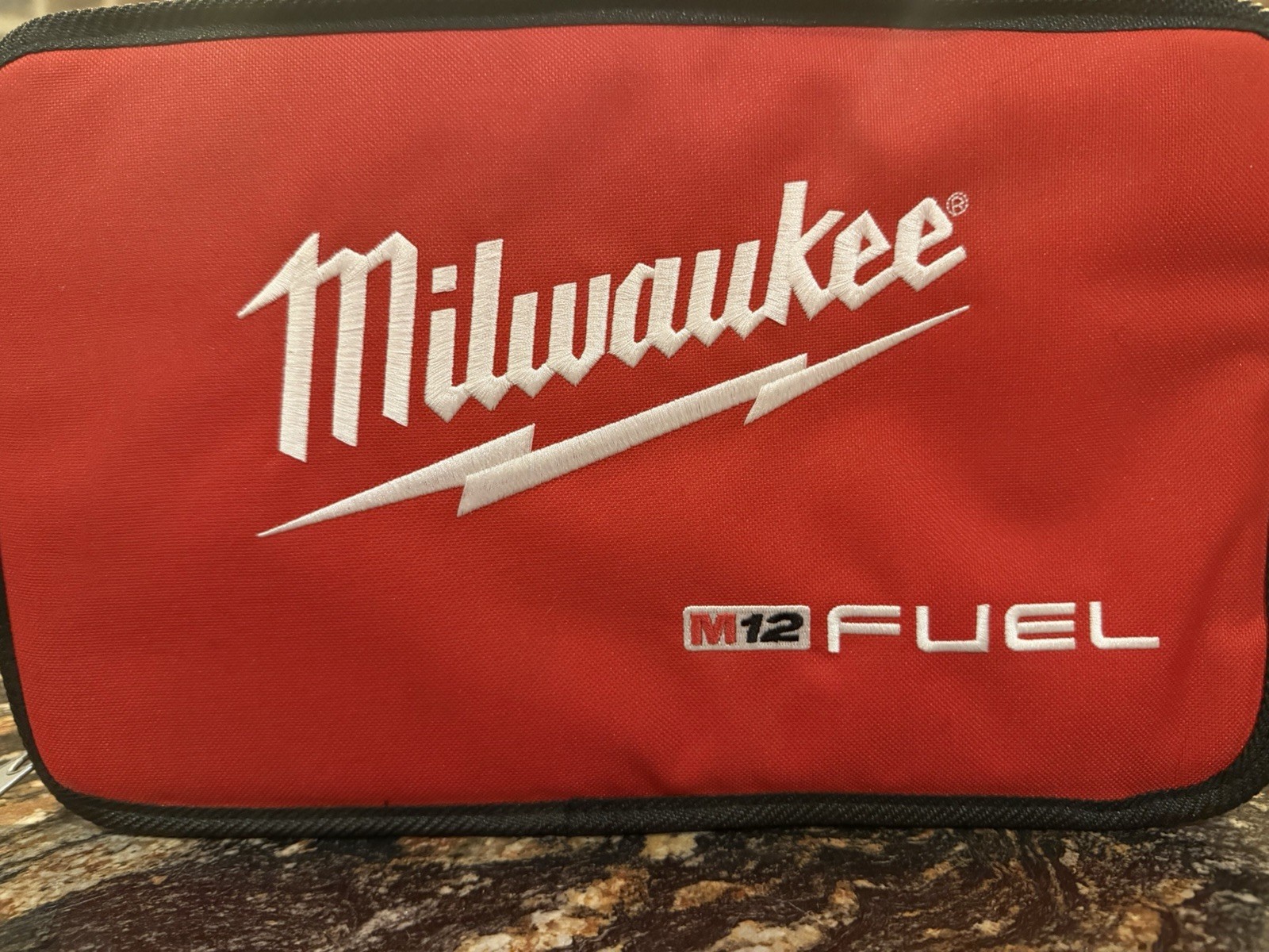 Milwaukee M12 FUEL Small Tool Bag Red/Black Zipper, Handle, Mesh 48-22-8122