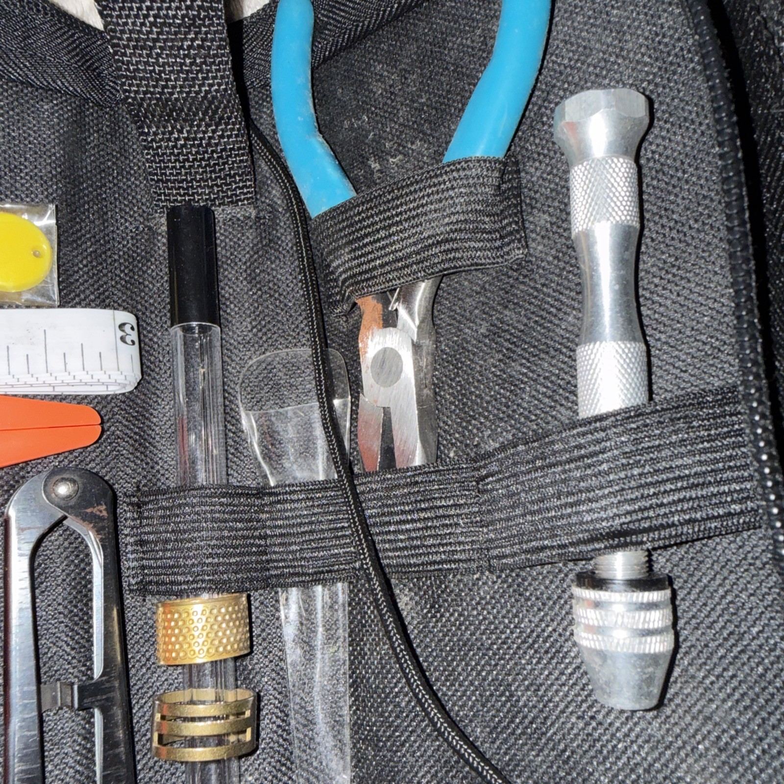 Utility pouch/small toolkit designed To Carry various small precision tools.