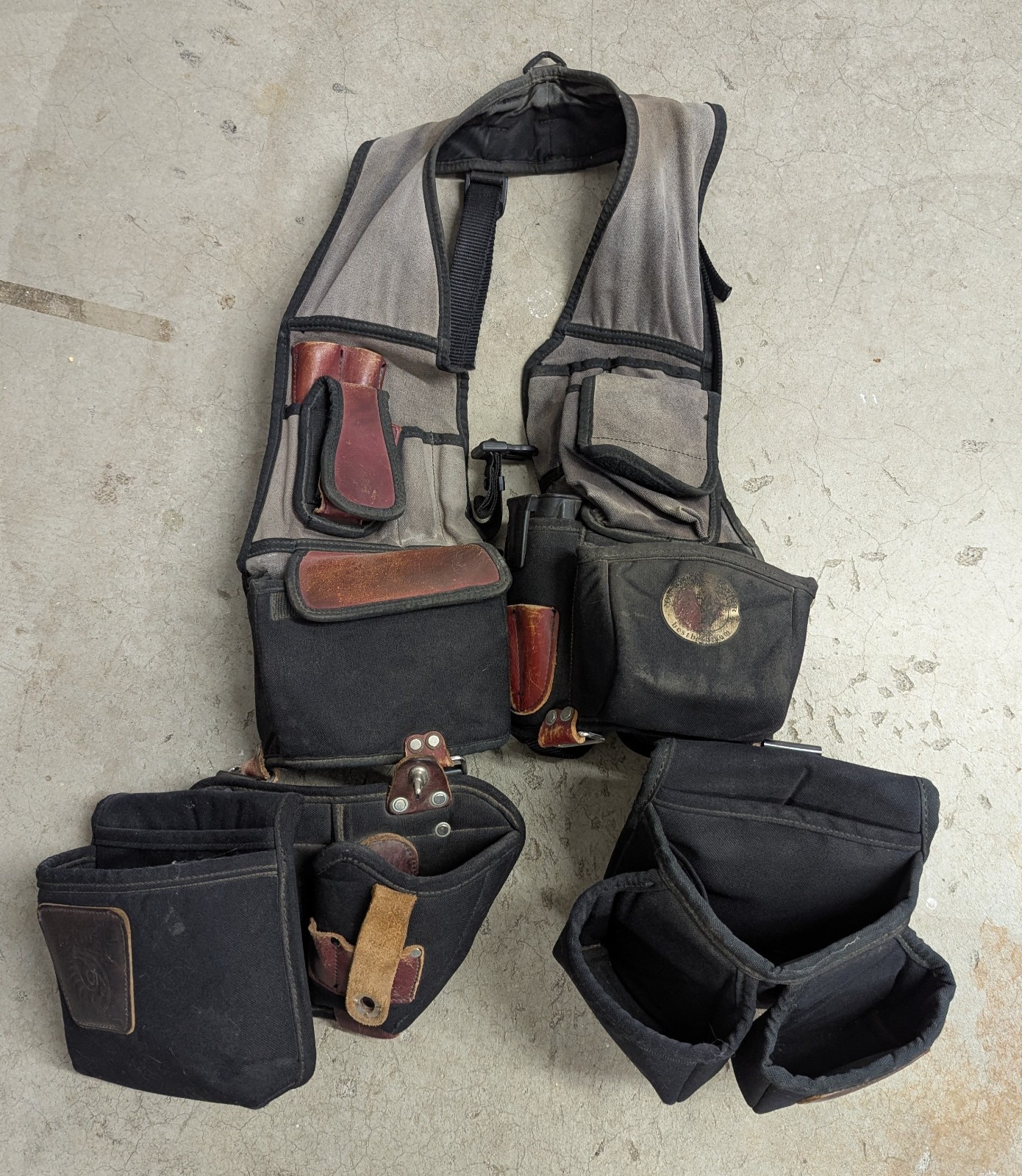 Occidental leather 2535 tool vest and pouches.