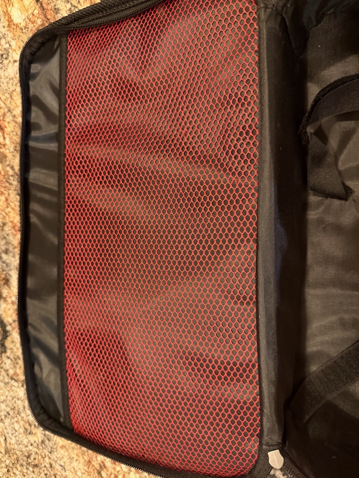 Milwaukee M12 FUEL Small Tool Bag Red/Black Zipper, Handle, Mesh 48-22-8122
