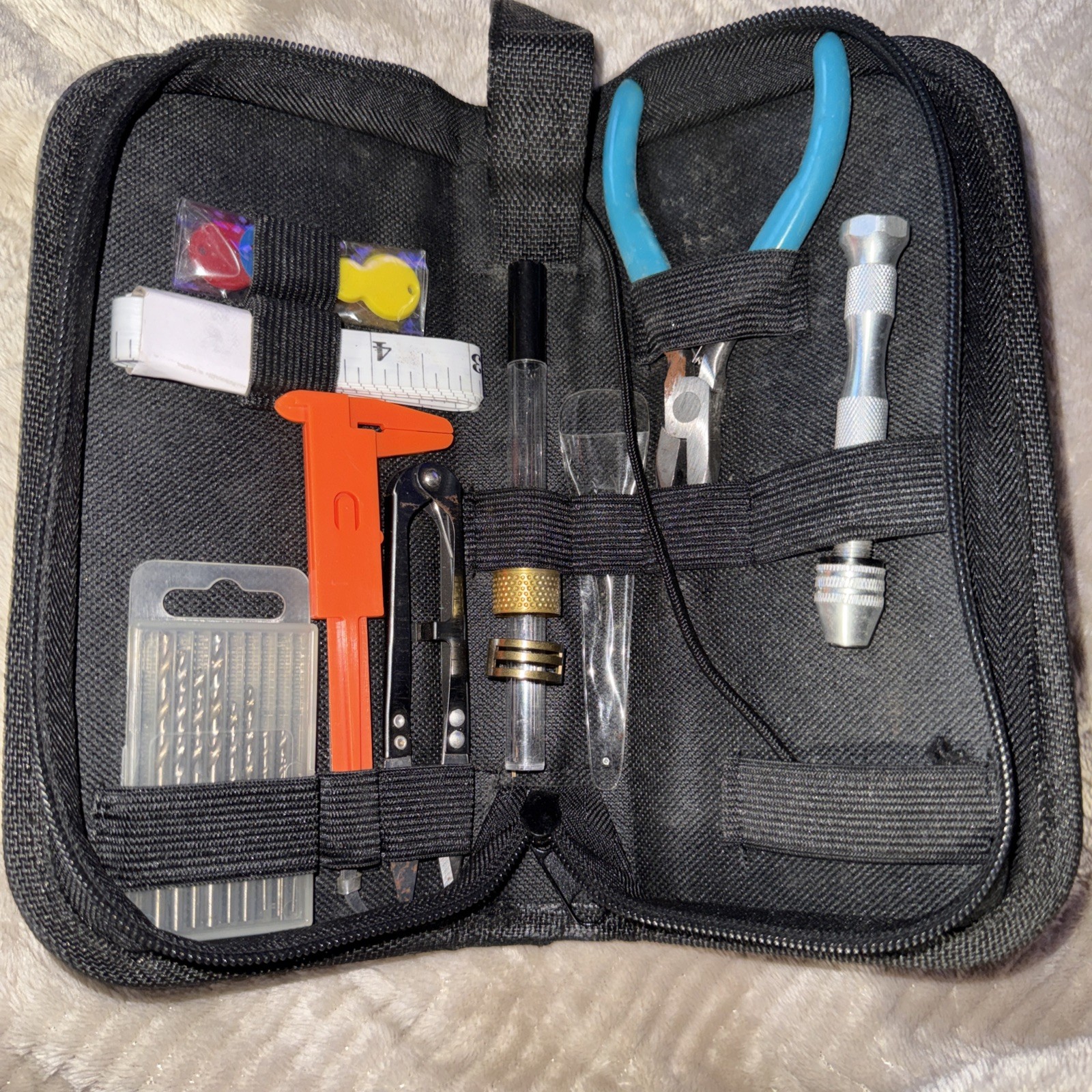 Utility pouch/small toolkit designed To Carry various small precision tools.